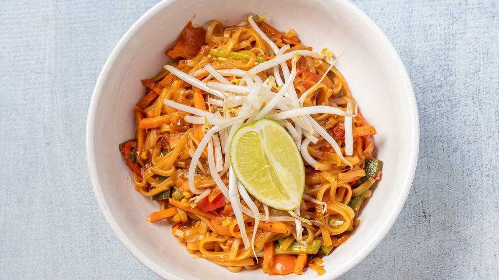 Thai Peanut · Rice noodles in a spicy peanut sauce with carrots, red peppers and scallions. Garnished with bean sprouts and a lime wedge. (Spicy)