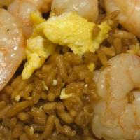 Shrimp Fried Rice · Large shrimp o with rice and eggs in soy based sauce.