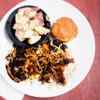 Chicken And Black Bean Combo Jaco With 2 Veggie Plates · Herb rice topped with rotisserie chicken, black beans, onion, Cheddar cheese, & Jaco sauce. ...
