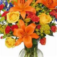 Awe-Inspiring Autumn Floral Arrangement · These vibrant fall flowers from blooms Royale florist will make any occasion special and mem...