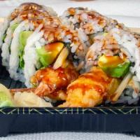 Shrimp Tempura Roll · Two pieces of deep-fried shrimp topped with eel sauce. All cooked, no raw fish.