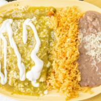 Enchiladas · Tortillas dipped in salsa Verde or roja with your choice of meat or cheese served with rice ...