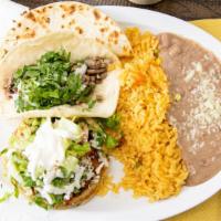 Gtq · Your choice of meat on a gordita and taco with a cheese quesadilla served with rice and beans.