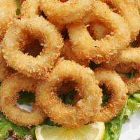 Fried Calamari  · Fried breaded squid rings (10oz). Perfect for drinking beer & snack.