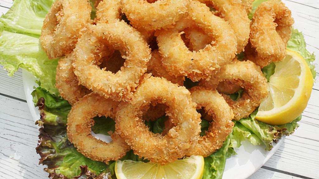 Fried Calamari  · Fried breaded squid rings (10oz). Perfect for drinking beer & snack.