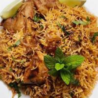 Fb'S Kodi (Chicken) Biryani · Spicy basmati rice cooked in biryani spices herbs and juicy chicken leg pieces.
