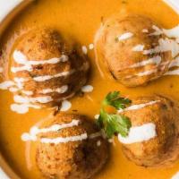 Vegetable Malai Kofta · Creamy fried balls of malai, cream, and panner with spicy vegetable gravy.