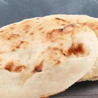 Chilli Naan · Flatbread made from white flour flavored with Indian spices and baked in tandoor oven.