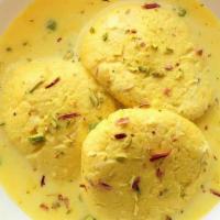 Tempting Rasmalai · Sweet juicy dumplings made from cottage or ricotta cheese soaked in sweetened, thickened mil...