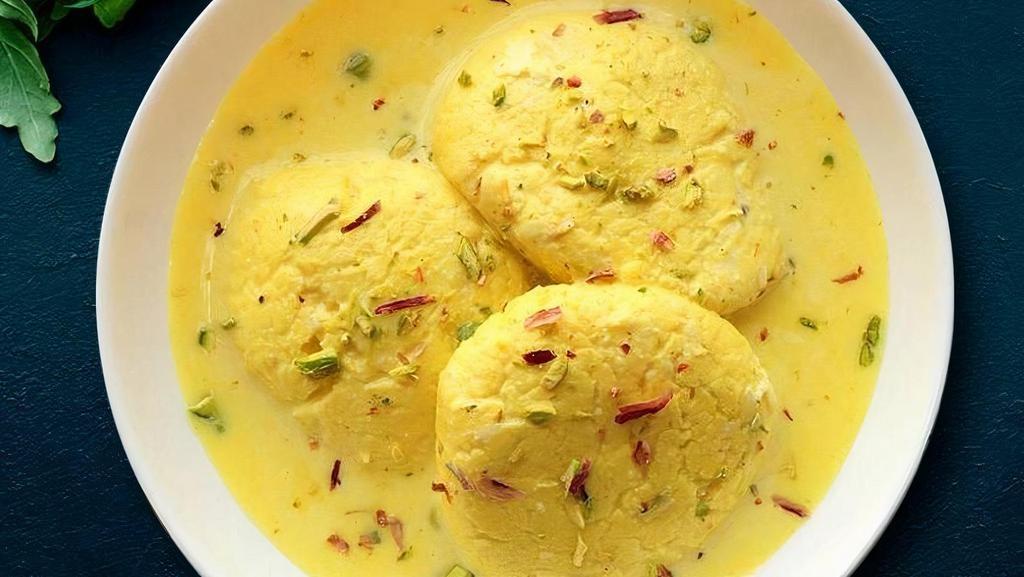 Tempting Rasmalai · Sweet juicy dumplings made from cottage or ricotta cheese soaked in sweetened, thickened milk delicately flavored with cardamom.
