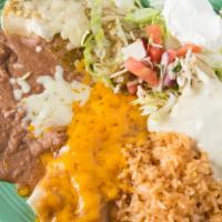 Trio Enchiladas · Combination of three enchiladas: one chicken, one cheese, and one beef. Topped with three di...