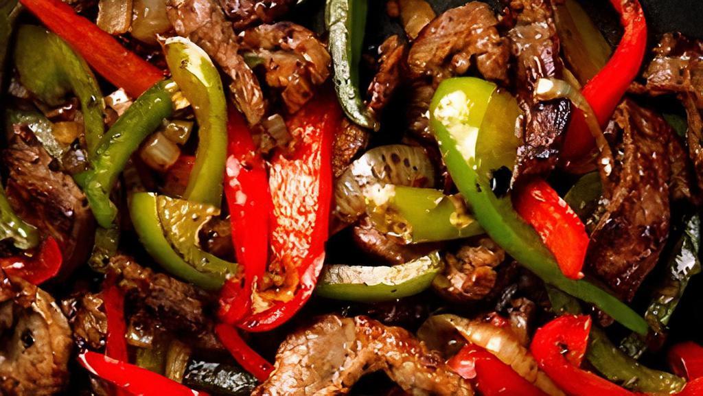 Steak Fajitas · Our famous authentic fajitas our sizzling fajitas are prepared with red peppers green peppers onions and our own house fajita sauce. served with rice.