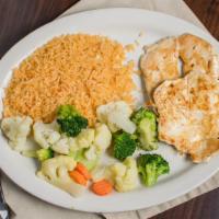 Pollo Ligero · Seasoned grilled chicken breast served with rice and steamed vegetables.