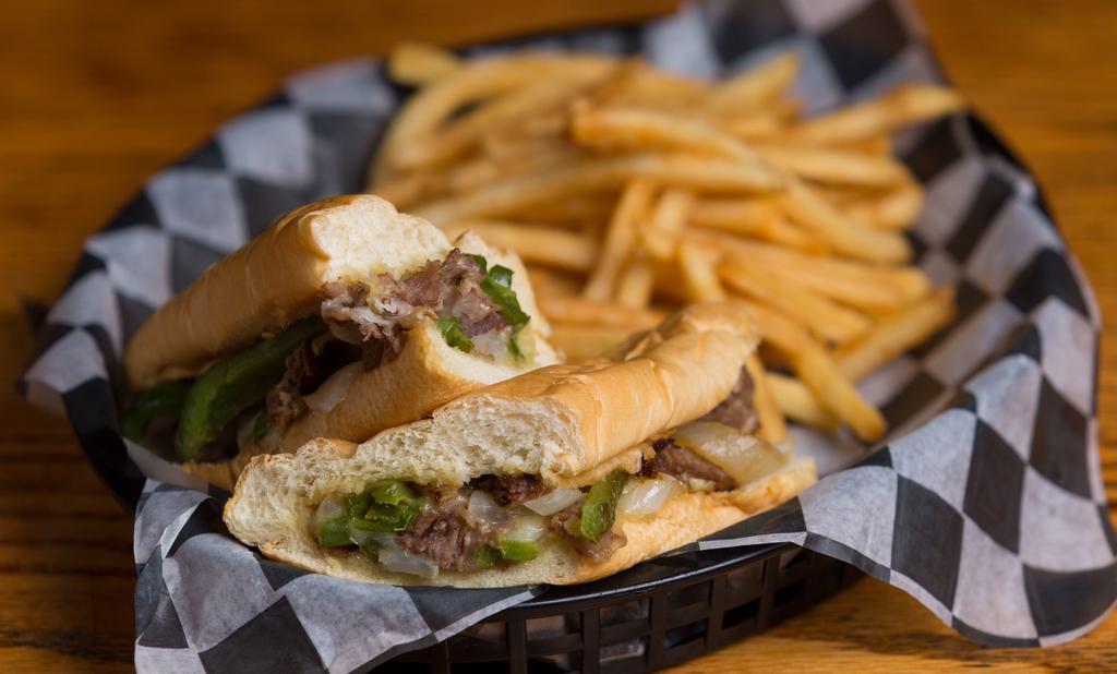 Signature Sub - Philly Steak Out · Shaved sirloin steak, cheese, grilled peppers & onions on a sub roll.