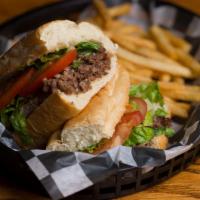 Signature Sub - Steak Burger · One of our most underrated menu items! A shaved sirloin & ground beef blend, topped with che...