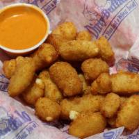 Ragin' Curds · Golden fried Wisconsin cheese curds lightly dusted with our signature Ragin' Cajun rub & ser...