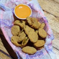 Fried Pickles · Coated in a seasoned house batter and served with either Southwestern sauce or ranch for dip...
