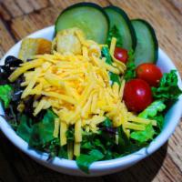 Side Garden Salad · Green salad with mixed vegetables. choice of dressing.