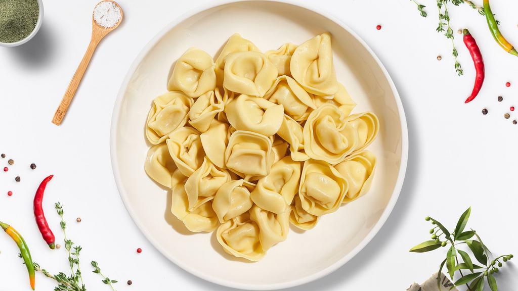 Byo Tortellini  · Tortellini cooked al dente with your choice of protein, toppings and homemade sauce.