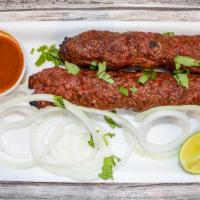 Beef Seekh Kebab · Rolls of ground beef spiced with ground ginger.
