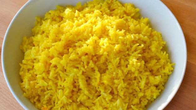 Saffron Rice · Richly flavored long grain basmati rice with the hint of cinnamon, clove and saffron.