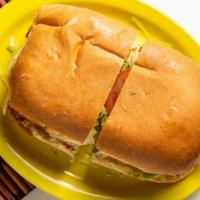 Torta · Any meat. Fresh Mexican bread, toasted with mayonnaise, re fried beans, lettuce, tomatoes, a...