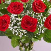 One Dozen Long Stem  Red Roses Clear Vase- #161776-12  · #161776-12 Our premium long stem red roses are an elegant surprise for the one you can trust...