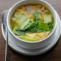 Wonton Soup · Chicken broth, chicken wontons, bok choy, scallion, cilantro, crispy garlic.