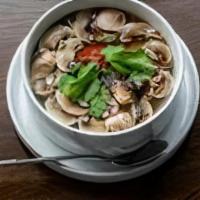 Tom Yum · Gluten-free, spicy. Spicy and sour soup, fresh Thai chili, lemongrass, mushroom, tomato, gal...
