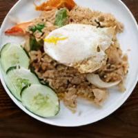 Basil Fried Rice · Spicy. Jasmine rice, fresh basil, bell pepper, onion, fresh Thai chili, fried egg.