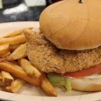 Fish Sandwich · Fish sandwiches come dressed with lettuce, tomato and tartar sauce.