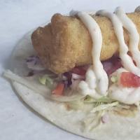 2 Fish Tacos · Our fish tacos come dressed with lettuce, tomato, onion and tartar sauce. Includes a side of...