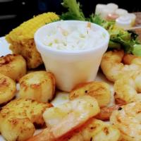 Grilled, 6 Shrimp & 5 Scallops Combo · Grilled shrimp and scallops seasoned with Cajun or lemon pepper.