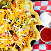 Taco Salad · Flour shell, beef or grilled chicken, onion, black beans,  jalapenos, tomato, cheese, sour c...
