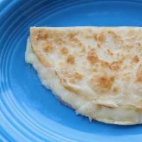 Cheese Quesadilla · A grilled flour tortilla filled with melted cheese.