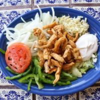 Grilled Chicken Salad · Savory grilled chicken with lettuce, bell peppers, cheese, onions, tomatoes, and sour cream.