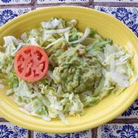 Guacamole Salad · A fresh lettuce, guacamole, and tomato salad.