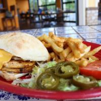 Grilled Chicken Breast Sandwich · Seasoned grilled chicken breast with melted cheese, lettuce, and tomato on a fresh ciabatta ...