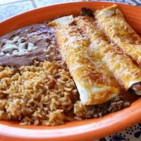 Burrito Supreme · Three burritos, each containing a different meat (juicy shredded chicken, fresh ground beef,...