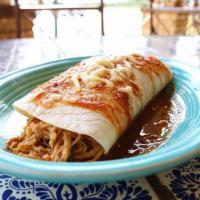 Burrito · A classic Mexican burrito filled with your choice of shredded chicken or ground beef, topped...