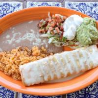 Chimichanga Meal · A flour tortilla filled with your choice of chunk beef or shredded chicken, deep fried golde...