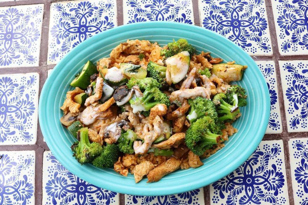 Veggie Feliz · Bed of fresh seasoned rice topped with grilled chicken, grilled broccoli, grilled zucchini, grilled mushrooms, and our signature cheese sauce.