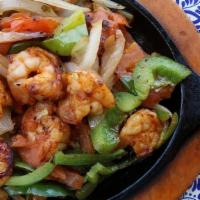 Shrimp Fajita · Delicious juicy shrimp, cooked with sauteed onions, bell peppers, and tomatoes. All fajitas ...