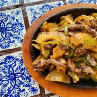 Hawaiian Fajita · A special mix of grilled pineapple, mushrooms, grilled bell peppers, grilled onions, and ten...
