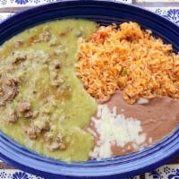Chili Verde · A traditional dish of tender beef chunks covered in a mild green chili sauce, served with fr...