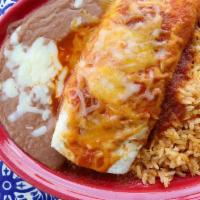 Burrito, Rice, And Beans · Kids' ground beef or shredded chicken burrito served with fresh rice and homemade refried be...
