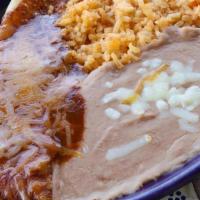 Enchilada, Rice, And Beans · Kids' enchilada with your choice of cheese, shredded chicken, or ground beef with a side of ...