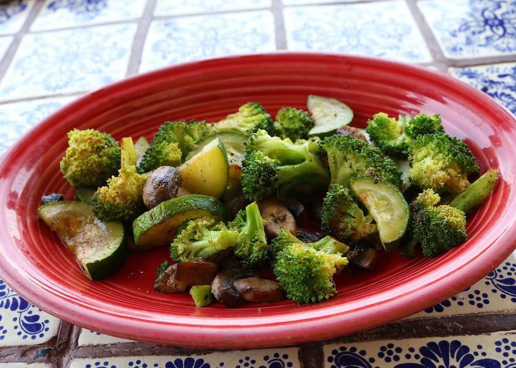 Grilled Vegetables · Perfectly seasoned and grilled zucchini, broccoli, and mushrooms.