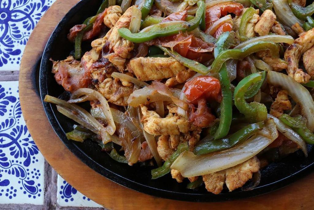 Lunch Fajitas · Tender strips of marinated chicken breast, beef skirt steak, or a mix of the two, cooked with sauteed onions, bell peppers, and tomatoes. All fajitas come with a fajita salad and your choice of corn or flour tortillas.