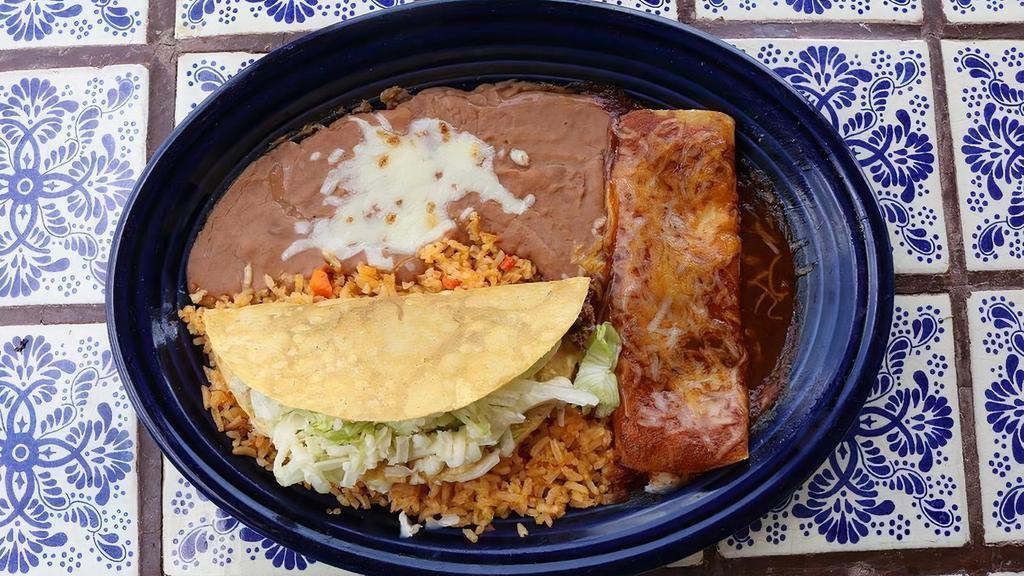Speedy Gonzalez · One ground beef or shredded chicken taco and one enchilada served with your choice of fresh rice or homemade refried beans.